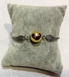 BRACCIALE IN METALLO HARRY POTTER QUIDDITCH BOCCINO D'ORO GOLDEN SNITCH SILVER - Picture 1 of 2