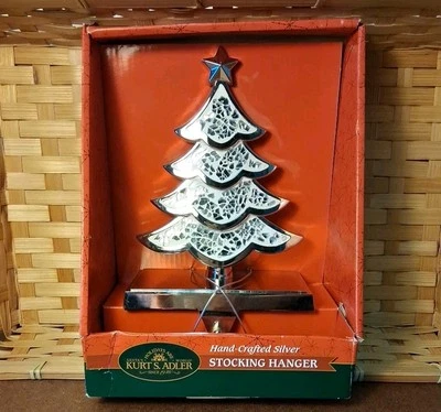 Colgador de Medias Kurt S. Adler Artesanal Tono Plata Vidrio Brillante Características Foto 1 de 4