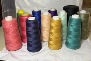 Konvolut 12 Nähgarne. Verschiedene Farben. - Bild 1 von 12