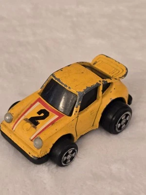 Coche fundido a presión amarillo Porsche Turbo 1977 vintage producto universal #2 carreras raro Foto 1 de 4