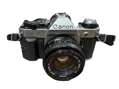 Cámara fotográfica Canon AE-1 SLR 35 mm con lente Canon FD 50 mm F1,8 [LEER - SOLO PIEZAS] Foto 1 de 4