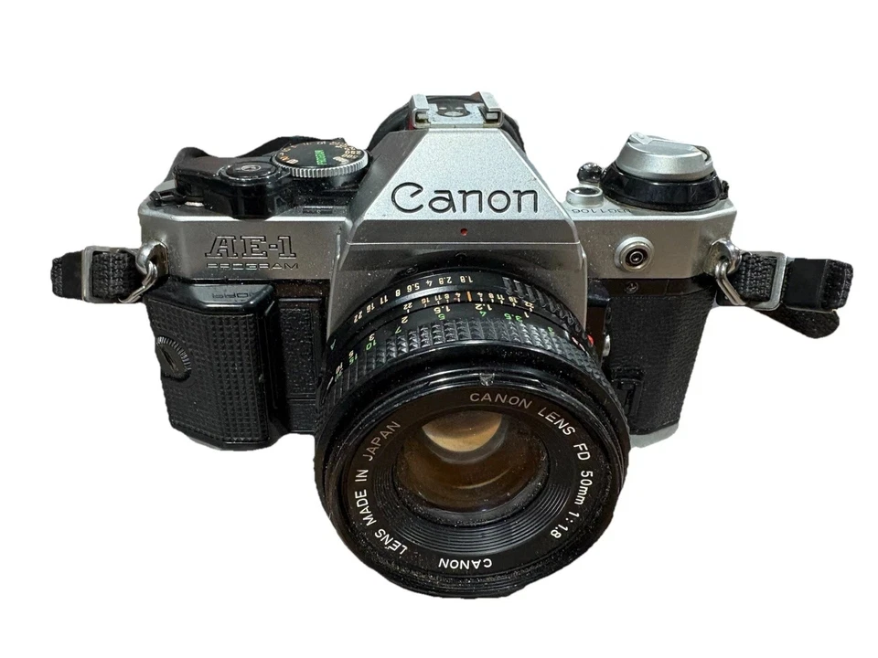 Cámara fotográfica Canon AE-1 SLR 35 mm con lente Canon FD 50 mm F1,8 [LEER - SOLO PIEZAS] Foto 1 de 4