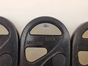 ORIGINAL LOT OF 5 NISSAN MAXIMA 00-01 OEM REMOTE FOB KEY LESS ENTRY WHOLESALE US - Picture 1 of 15