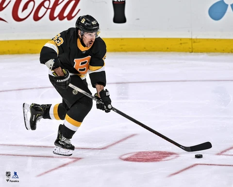 Brad Marchand Boston Bruins Unsigned Alternate Jersey Skating Photo Cover