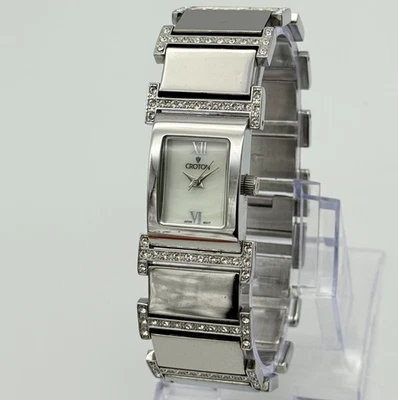 Reloj pulsera para mujer CROTON cristal acentuado, tono plata brillante, esfera MOP Foto 1 de 4