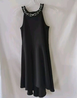 Vestido negro sin mangas alto bajo para niñas Foto 1 de 2