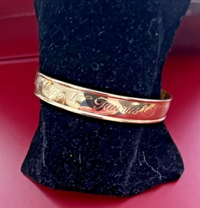 VTG Avon Star Signs, TAURUS, Gold-Tone Engraved Cuff Bracelet LOYAL DEPENDABLE - Picture 1 of 3