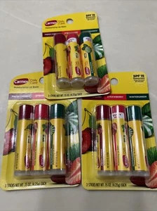 (3) Paquete de 3 bálsamo labial hidratante de sabor surtido Carmex cuidado diario FPS 15 - Imagen 1 de 3