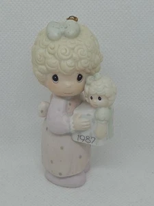 Precious Moments 1987 Ornament Girl with Gift & Doll Love is Best Gift - Picture 1 of 5