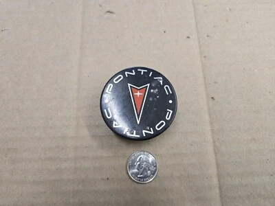 Tapacubos central Pontiac OEM 1997-2009 Aztek Bonneville Grand Am Prix 9593169 Foto 1 de 3