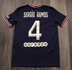 CAMISETA DE FUTBOL PARIS SAINT-GERMAIN 2021/22 LOCAL SERGIO RAMOS JUVENIL 158-170 CM. - Imagen 1 de 12