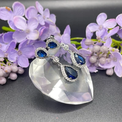 White gold finish blue sapphire pear cut created diamond dangle drop earrings - Image 1 of 4
