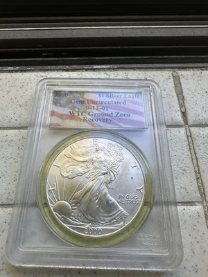 2000 Silver Eagle $1 WTC Ground Zero Recovery PCGS Gem Uncirculated - Image 1 of 2