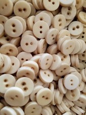 Approximately 600 buttons in storage vintage stained still good for craft projec