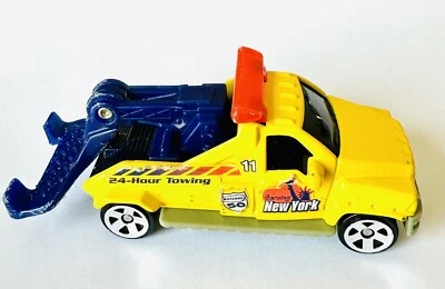 Camión grúa MCD Matchbox 2002 1:64 Nueva York remolque 24 horas recuperación amarilla Foto 1 de 4