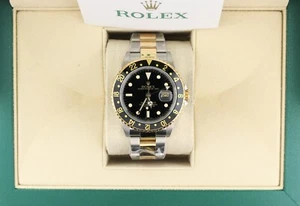 2006 Rolex GMT-Master 16713 Black Dial TT 18kt Gold Thru Oyster With Papers 40mm - Picture 1 of 11