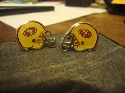 Gemelos de colección de los 49ers de San Francisco de la era de 1990 de la era de Joe Montana con fecha 1996 NFL Foto 1 de 3