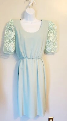 Vestido Miss Elliette verde menta vintage años 70 80 mangas transparentes adornadas 8 Foto 1 de 4