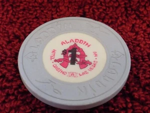 (TOLL) $1 ALADDIN HOTEL CASINO POKER CHIP LAS VEGAS NEVADA GLÜCKSSPIELMARKE 1980er - Bild 1 von 2