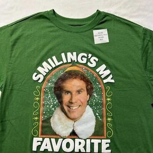 Elf WB Holiday "Smiling's My Favorite" Green Christmas Size Medium T-Shirt NWT - Picture 1 of 14