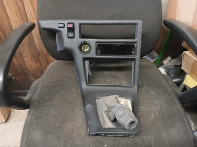 86-92 TOYOTA SUPRA MK3 TABLERO CONSOLA CENTRAL RADIO M/T PANEL DE AJUSTE DE CAMBIO OEM Foto 1 de 4