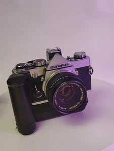 ▶[COMO NUEVA] Cámara fotográfica Olympus OM1 OM-1 + Lente Auto-S 50 mm f1,4 con empuñadura - Imagen 1 de 8