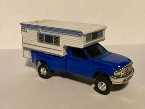 Ertl 1/64 Ford F-350 dually pickup truck w/ camper - Picture 1 of 5