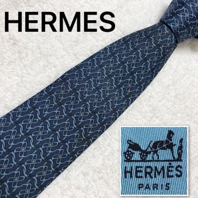 Corbata Hermès, accesorios metálicos, patrón integral, 100 % seda, hecha en Francia, azul Foto 1 de 4