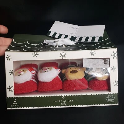 Lindo conjunto de 2 pares de calcetines de Navidad para bebé Laura Ashley 0-12 meses Santa reno Foto 1 de 4
