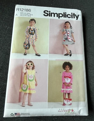 Simplicity Pattern R12186 Toddlers' Dress Sleeve Variations & Purse Sz 1/2-4 Unc - Image 1 of 4
