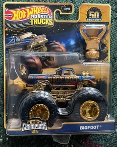 HOT WHEELS MONSTER TRUCKS CHAMPIONS TROPHY BIGFOOT 50 GOLD - Picture 1 of 2