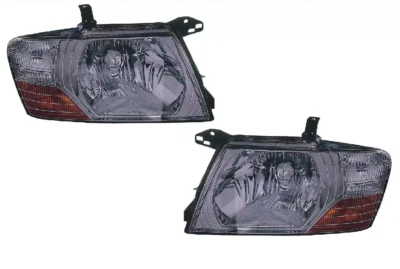2 X FARO FANALE PROIETTORE ANTERIORE PER MITSUBISHI PAJERO 2003 2006 H4 CROMATO - Imagen 1 de 2