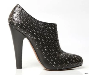 ALAIA Cuero Negro Botín 38.5 US 8.5 OJALES TACHONADOS BOTAS TOBILLO Nuevas $1630 - Imagen 1 de 8