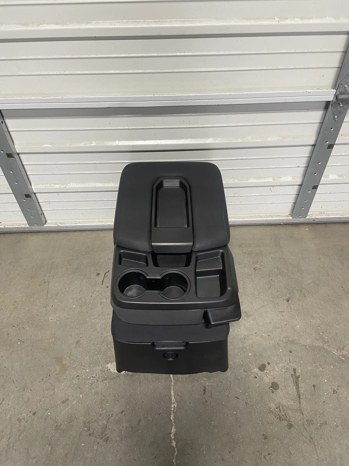 Chevrolet Silverado GMC Sierra Tahoe 2019-2025 consola central asiento de salto almacenamiento Foto 1 de 4