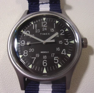 Timex military style watch. Quartz. Indiglo. 39mm. Pre-owned, new strap. - Picture 1 of 9