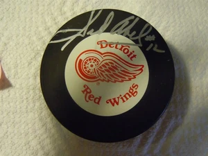 TRENCH MFG. SID ABEL #12 DETROIT RED WINGS AUTOGRAPHED PUCK NHL 3" DIA NO COA - Picture 1 of 2