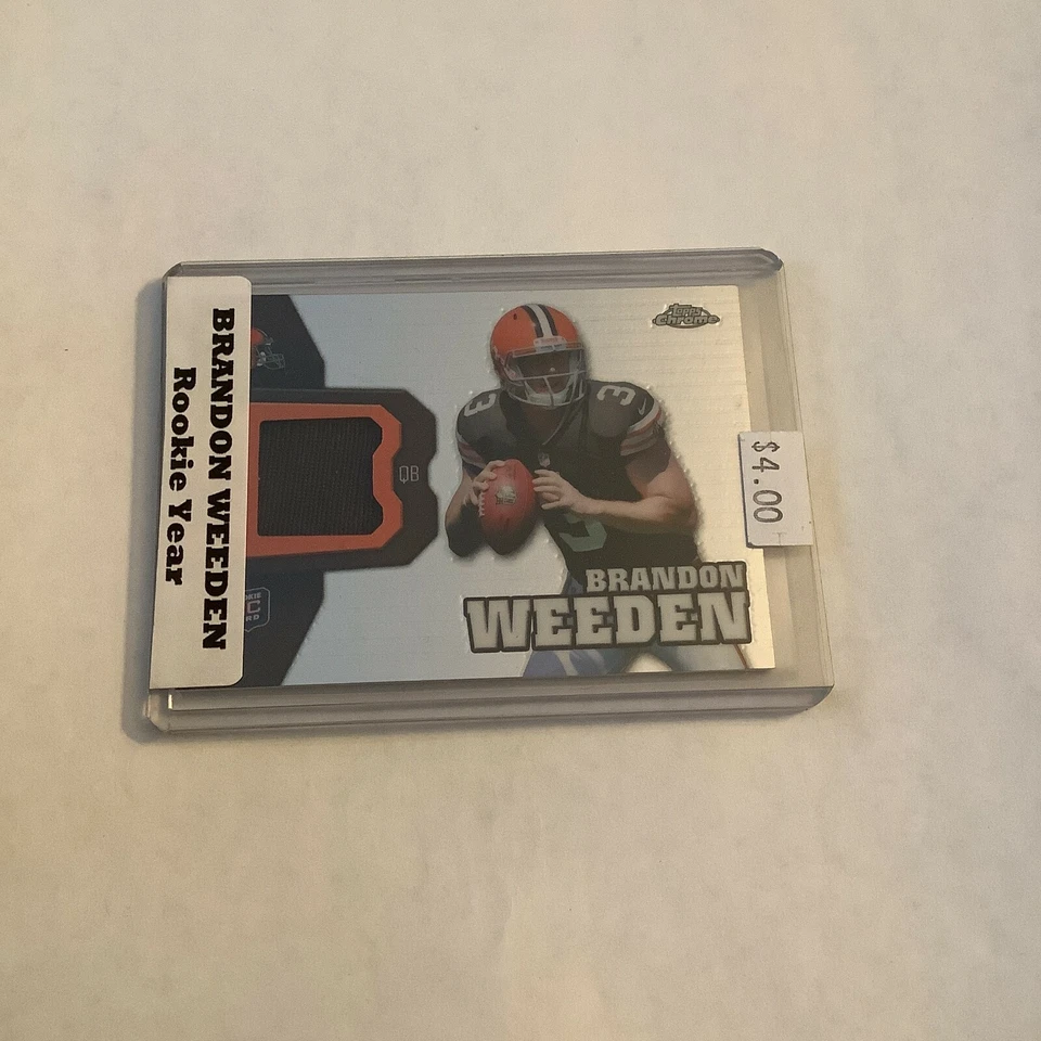 F100,111  2012 Topps Chrome Rookie Relics #RR4 Brandon Weeden BROWNS - Image 1 of 1