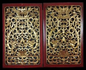PAIR OF CHINESE WOOD PLATES. CARVED, POLYCHROMED AND GILDED. CHIN. XIX CENTURY