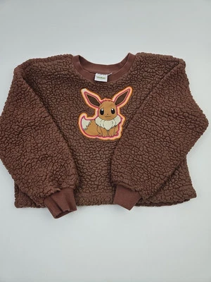 EeVee Nintendo Pokemon Marrón Peluche Acogedora Niños Talla Pequeña Sudadera Usada  Foto 1 de 4
