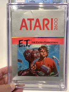 ATARI 2600 E.T. THE EXTRA-TERRESTRIAL 1982 VIDEOGIOCO - GRADO 6,5 CGC - SIGILLATO - Foto 1 di 9