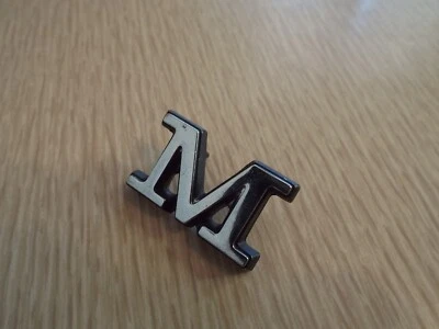 NOS M Tail Gate Emblem 1973 1978 Mercury Marquis Montego Cougar Station Wagon 77 - Image 1 of 4