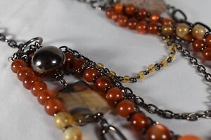 Multi Strand Amber Colored Beads And Gun Metal Chains Statement Necklace