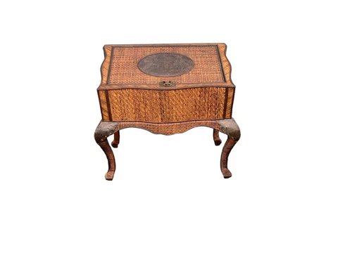 Wrapped wicker with cabriolet legs treasure chest with carved metal palm plaque Cover