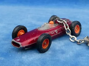 RARE ! PORTE-CLES Key ring MAJORETTE RAIL ROUTE 1:55 FERRARI F1 N° 10 - ACCIDENT - Foto 1 di 9