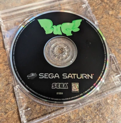 BUG Sega Saturn DAMAGED DISC (LOOSE) not-functional video game retro 1995 - Image 1 of 3