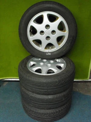 4St.Nissan Alu So.kompletträder 6,0x15  ET40 4x114,3 - Bild 1 von 2