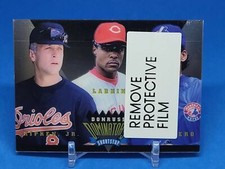 1995 Donruss Dominators #6 OF 9 Cal Ripken Jr. Barry Larkin Wil Cordero Shortsto