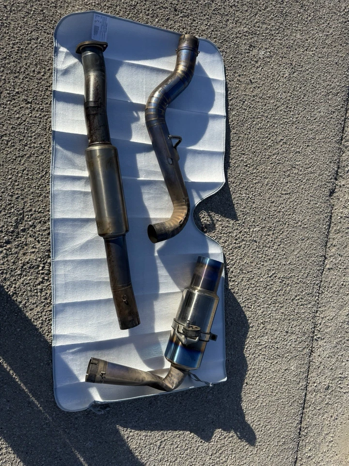 Used Tomei Expreme Titanium Exhaust (damaged) Fits 2013 Subaru WRX STI Sedan - Image 1 of 4