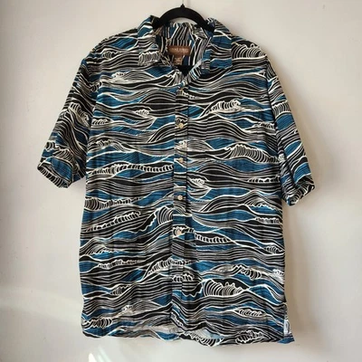 Camisa Cooke Street Hawaiian Islands Hombres XL Aloha Azul Negra Estampado Onda Abotonada Foto 1 de 4