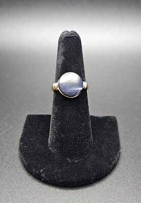 Золотое кольцо с черной перламутровой пуговицей - Изображение 1 из 3